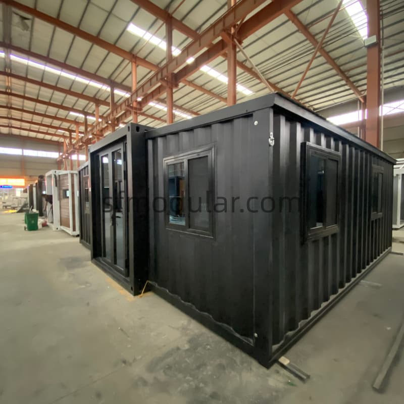 Dark premium expandable container house exterior design