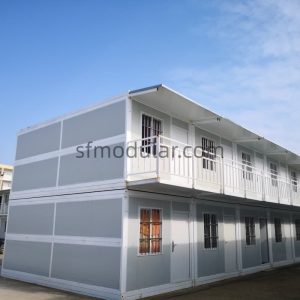 Modern prefabricated office building exterior with white modular panels