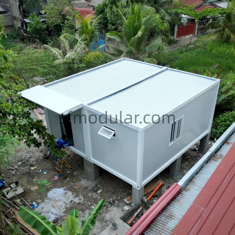 18 square meter modular studio home exterior with one door and two windows