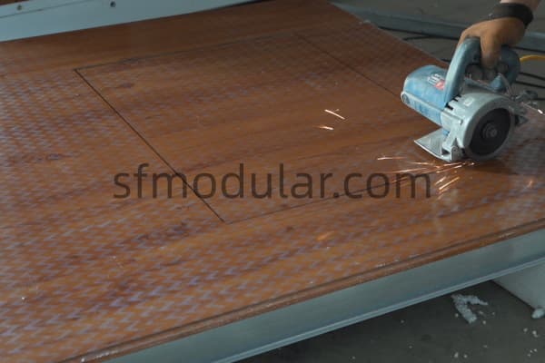 Floor panel cutting in container house factory