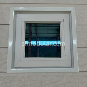 White framed window detail on a granny pod for backyard use