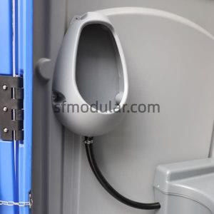 Urinal detail inside a portable toilet for events with compact sanitary design