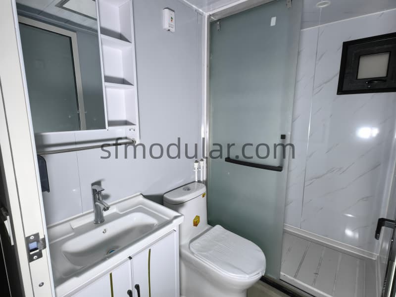 Bathroom design inside expandable tiny home on wheels