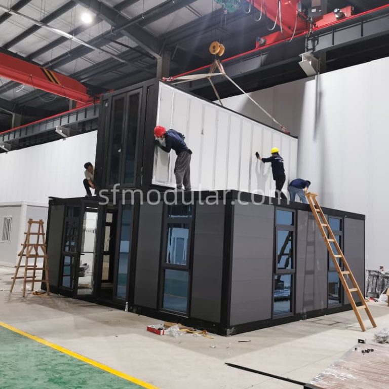 Structural testing of an expanding tiny house at the factory, illustrating the rapid deployment mechanism of our expandable prefab tiny home.