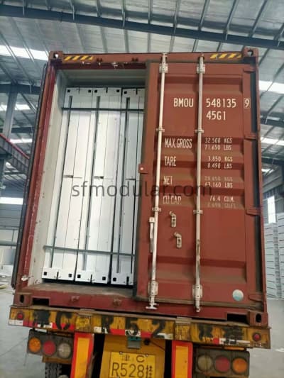 Foldable container house loaded into shipping container for international transport