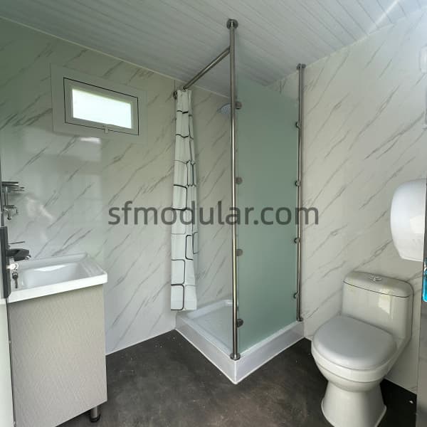 portable-toilet-with-shower-full-interior-layout Full interior layout of portable toilet with shower, toilet and basin
