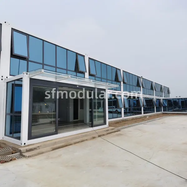 Modern two-story temporary prefabricated office building with glass facade exterior view