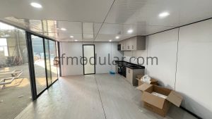 Interior fit-out option for a prefab studio with bathroom or utility area