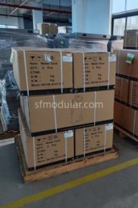 Water tanks of standard portable toilet packed on pallet for shipment