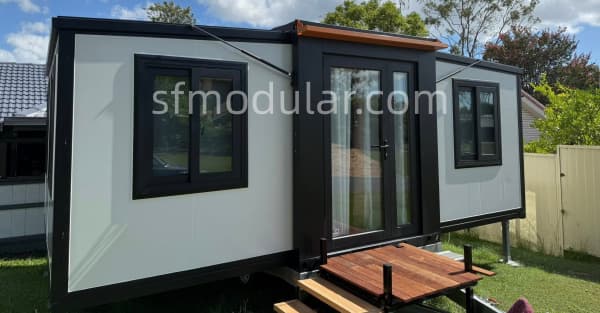 Expandable container house used as a construction site office