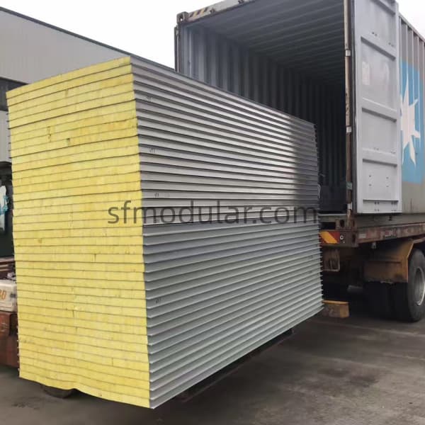 Detachable container house wall panels loaded for container shipment