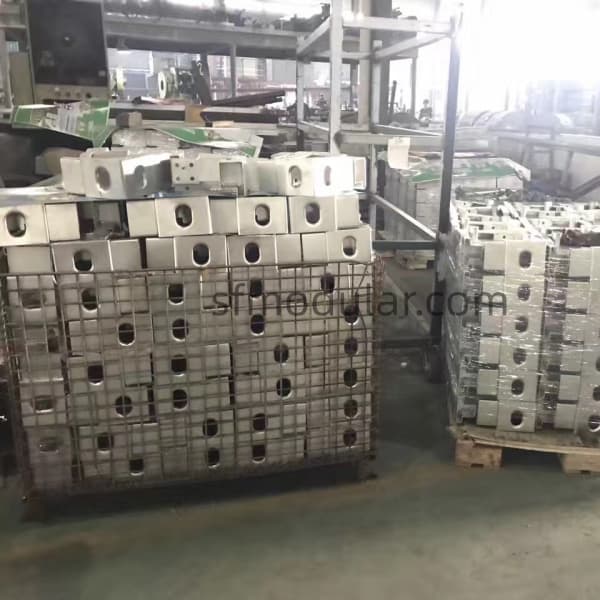 Quick assembly container house frame components stacked in factory for packing