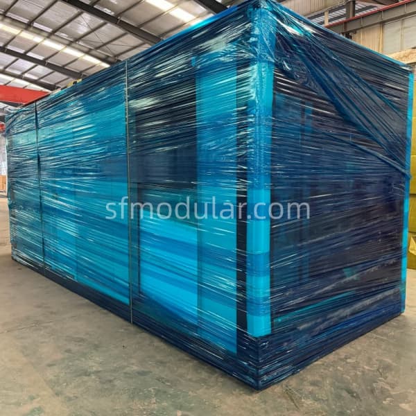 Wrapped backyard granny pod prepared for shipment in factory
