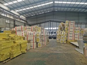 Insulation panel storage for flat pack container house production in factory