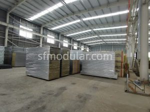 Factory material storage area for ADU modular homes and flat pack container production